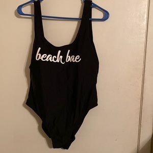 Women’s Junior’s black Swimsuit Size 15/17. Only worn once, no longer fits.